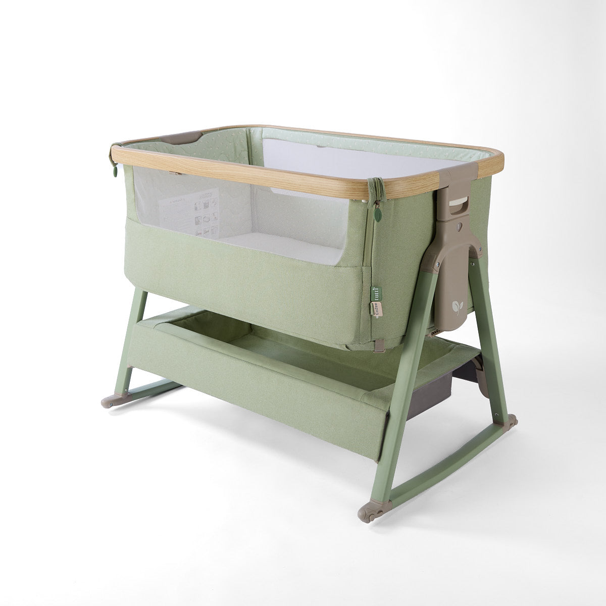 CoZee Air 2 bedside crib in eucalyptus with rocking bars, 6 height positions, side open, storage, in a white background 