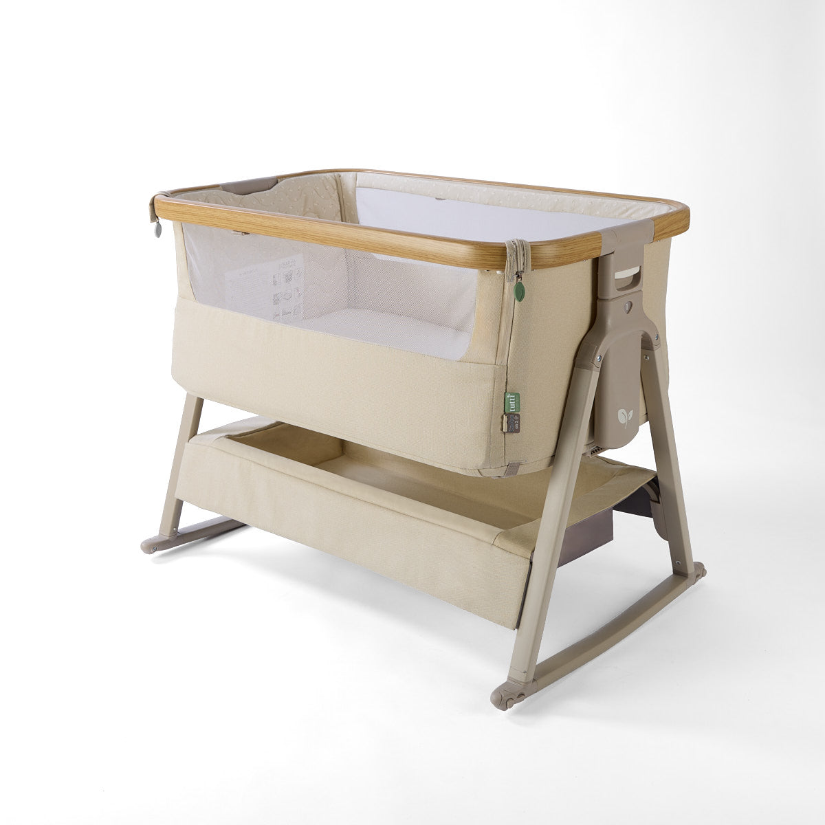 CoZee Air 2 bedside crib in sand with rocking bars, storage, 6 height positions in a white background 