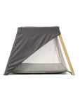 CoZee Go 3-in-1 Travel Cot – Side view with partial day and night shade coverage for adjustable light control
