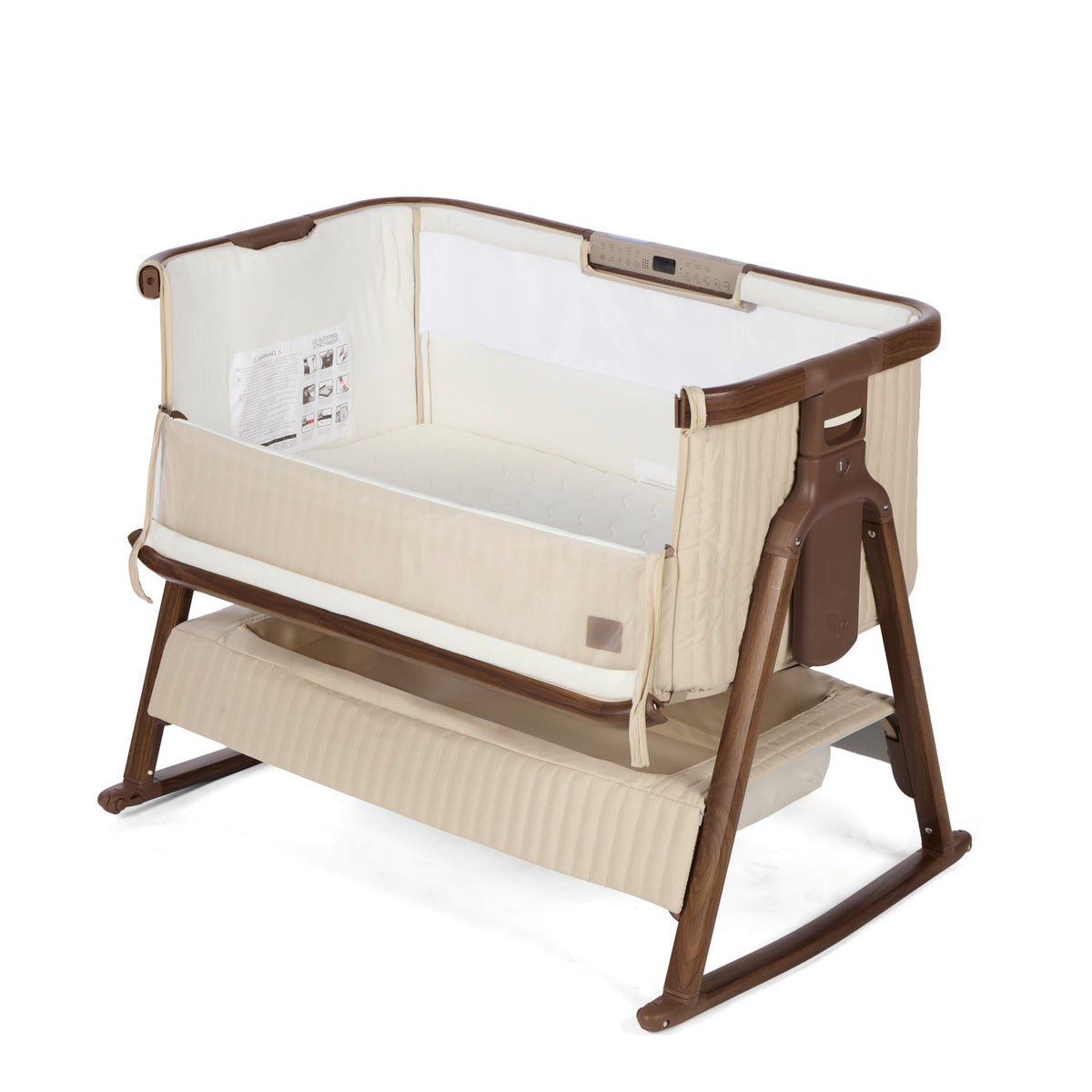 CoZee Sense in rich walnut and quilted cashmere crib with mesh and quilted lining sides, storage and sensory bar on a white background.