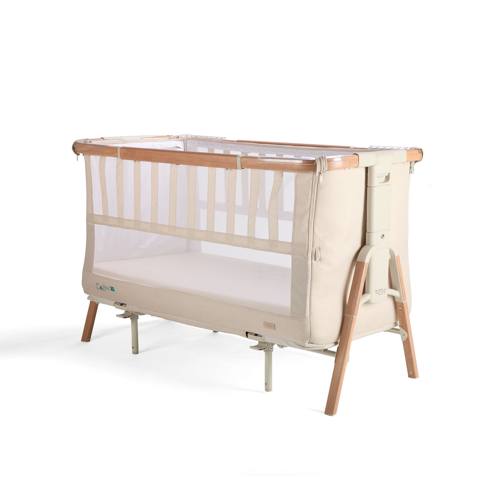 Angled cutout view of the CoZee XL Cot in Scandi with mesh side panels and solid wooden legs for a modern, functional design