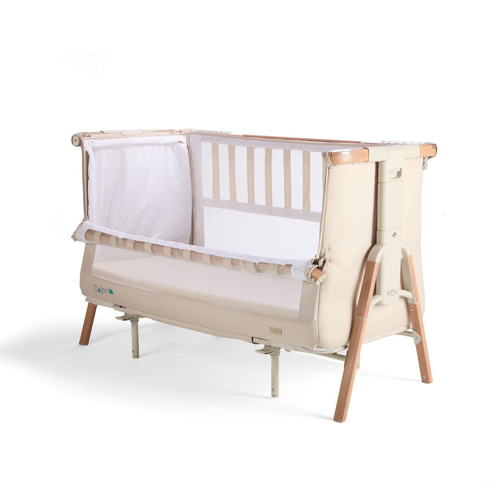 Angled cutout of the CoZee XL Scandi cot with side lowered, showing sturdy frame and mesh design