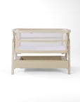 CoZee Zen sand crib with white mattress on a white background