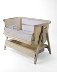 CoZee Zen sand baby crib with side open and white mattress on a white background