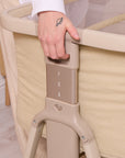 Close-up of the CoZee Zen in sand height adjustment panel, showing three clearly marked levels for safe bedside alignment.
