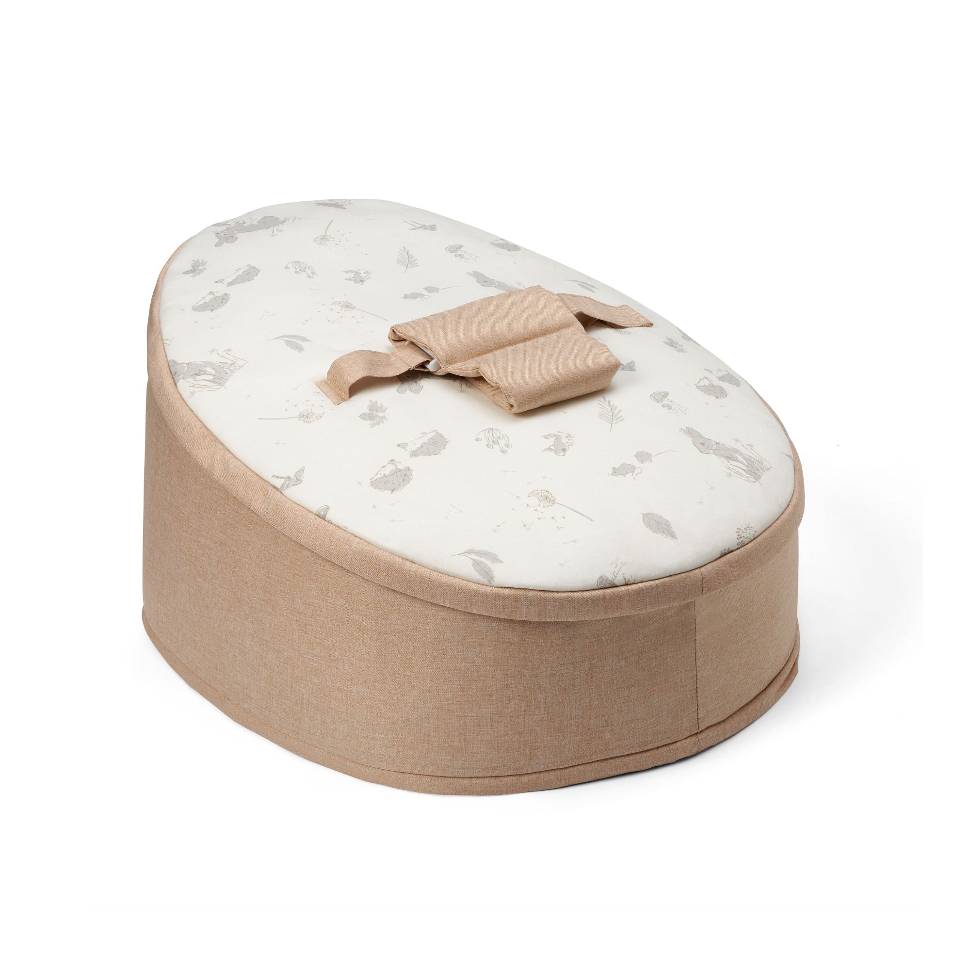 A beige baby beanbag chair featuring frolicking bunnies and delicate leaves.
