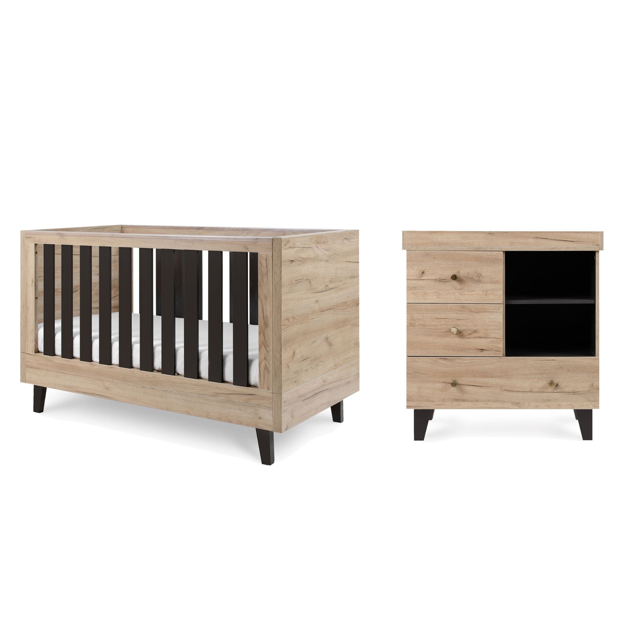 Cutout view of the Como cot bed and chest changer in distressed oak and slate grey, showing contrasting slats, storage drawers, and sturdy legs