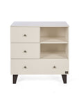 A front view of the Como chest changer in cashmere with three drawers and open shelving for organised nursery storage.