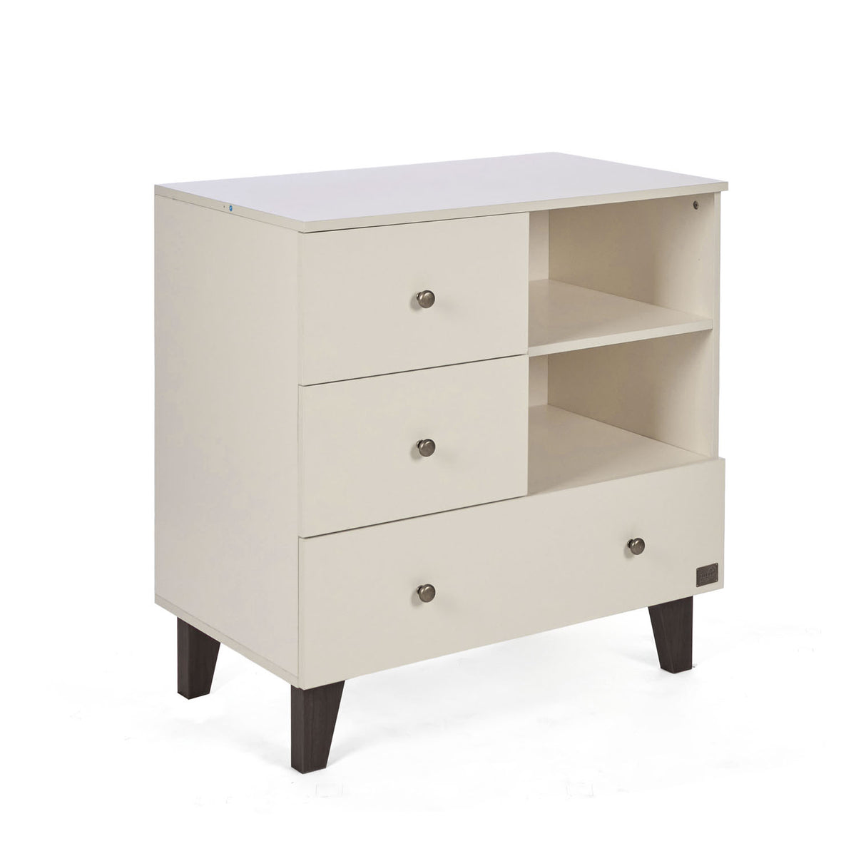 A side view of the Como chest changer in cashmere with three drawers and open shelving for organised nursery storage.