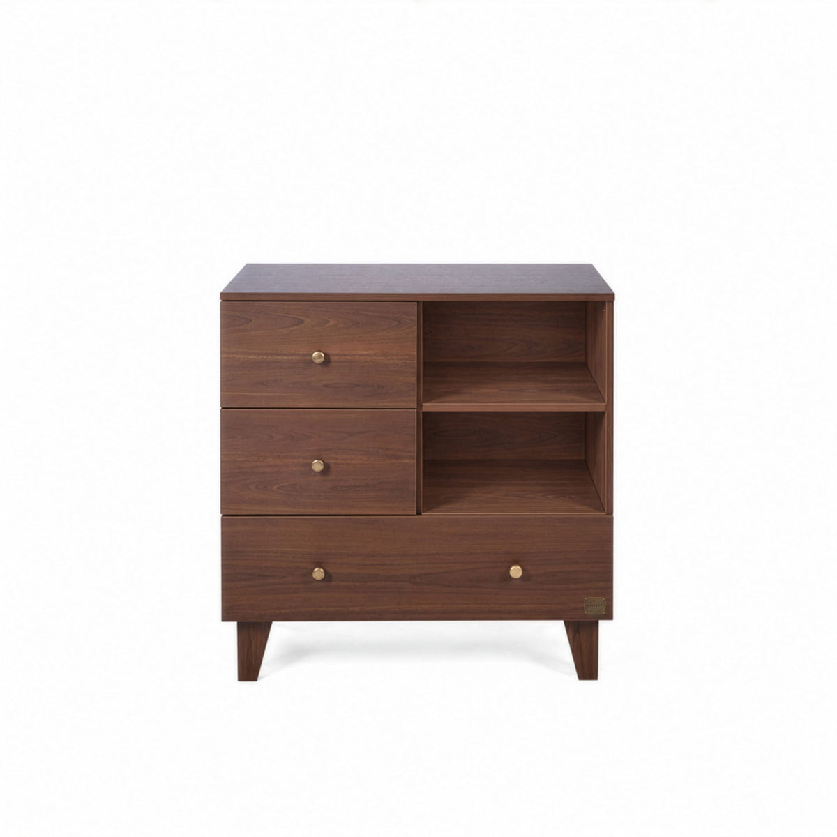 A front view of the Como chest changer in walnut with three drawers and open shelving for organised nursery storage.