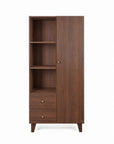 A tall wooden nursery wardrobe with a dark brown walnut finish, featuring three open shelves, with two drawers at the bottom with matching knobs, one closed door with the matching knob, and tapered legs, shown on a white background.