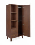 A modern wooden nursery wardrobe with a dark walnut finish. Featuring an open door on the right, with two metal hanging rails, three shelves on the left, and beneath two drawers with brass knobs shown on a white background.