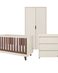 A three-piece nursery furniture set including a cot bed, a wardrobe, and a three-drawer changing table, shown on a solid white background.