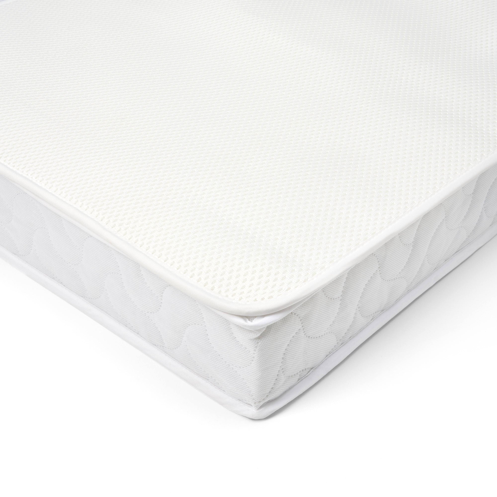 Corner view of breathable cot bed mattress with mesh cover and quilted sides for comfort and enhanced airflow