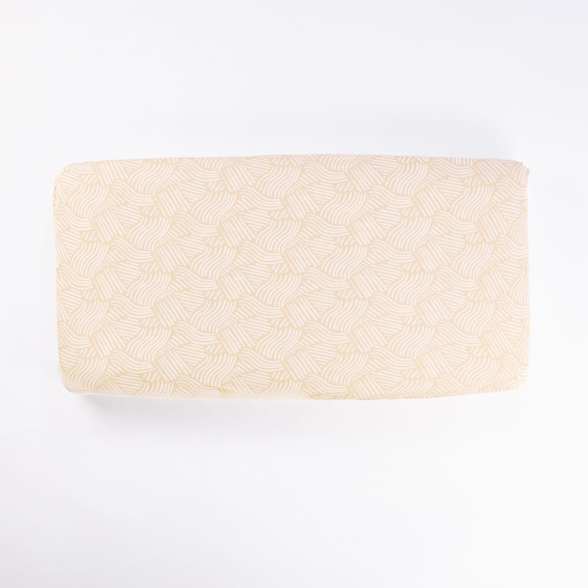Good Life cot bed fitted sheet in honey wave print, shown flat on white background with fully elasticated edge for secure fit.