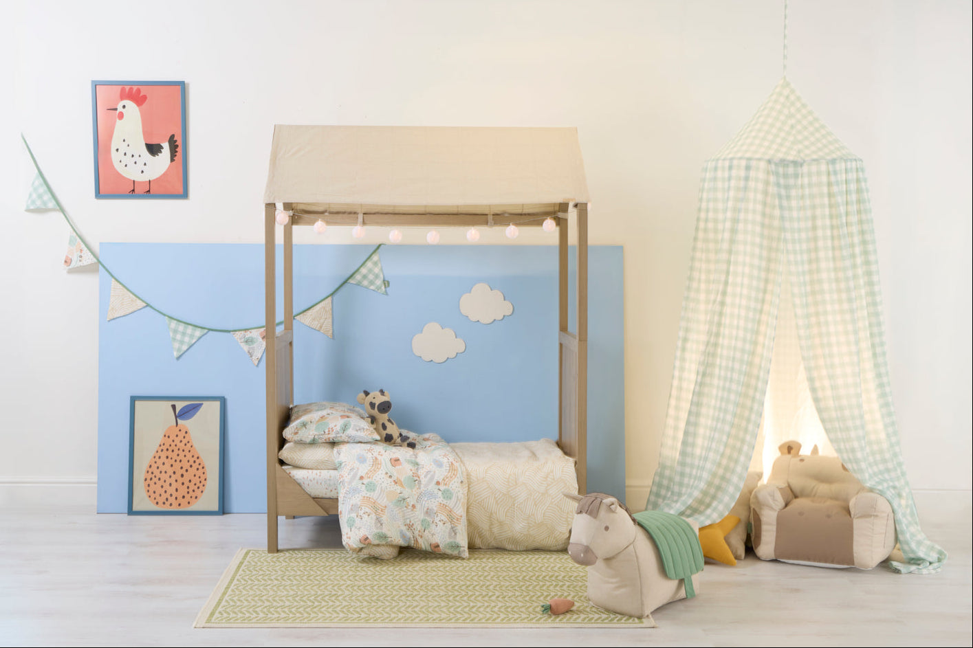 Children's bedroom with a bed, toys, and decorative elements on a light background