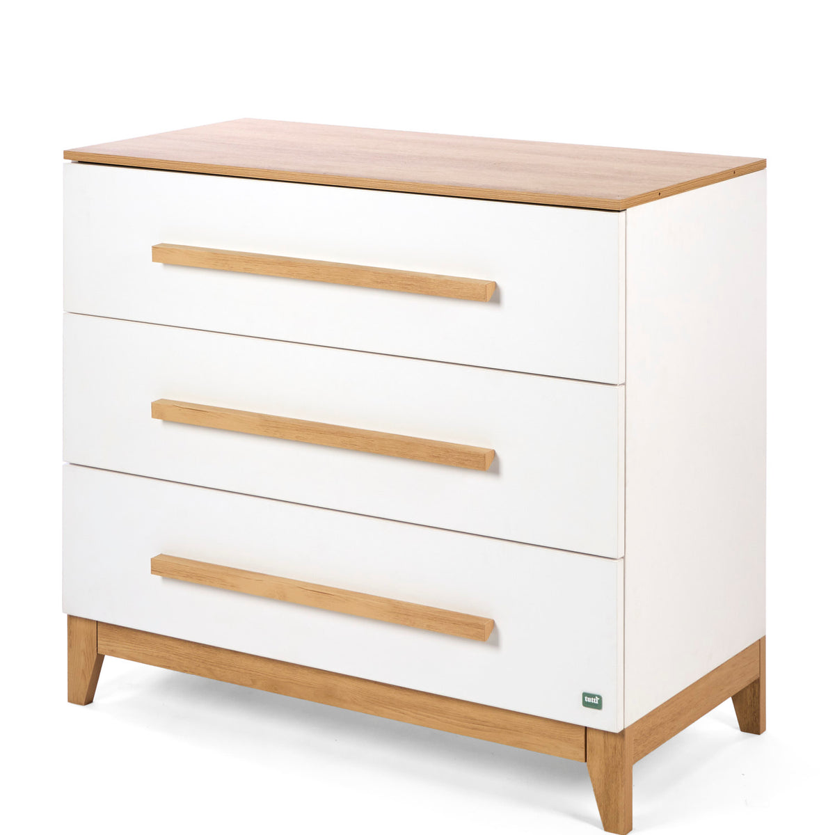 In an angle view, the Hallee chest changer in white and golden oak with three drawers and removable changing top on white backdrop.