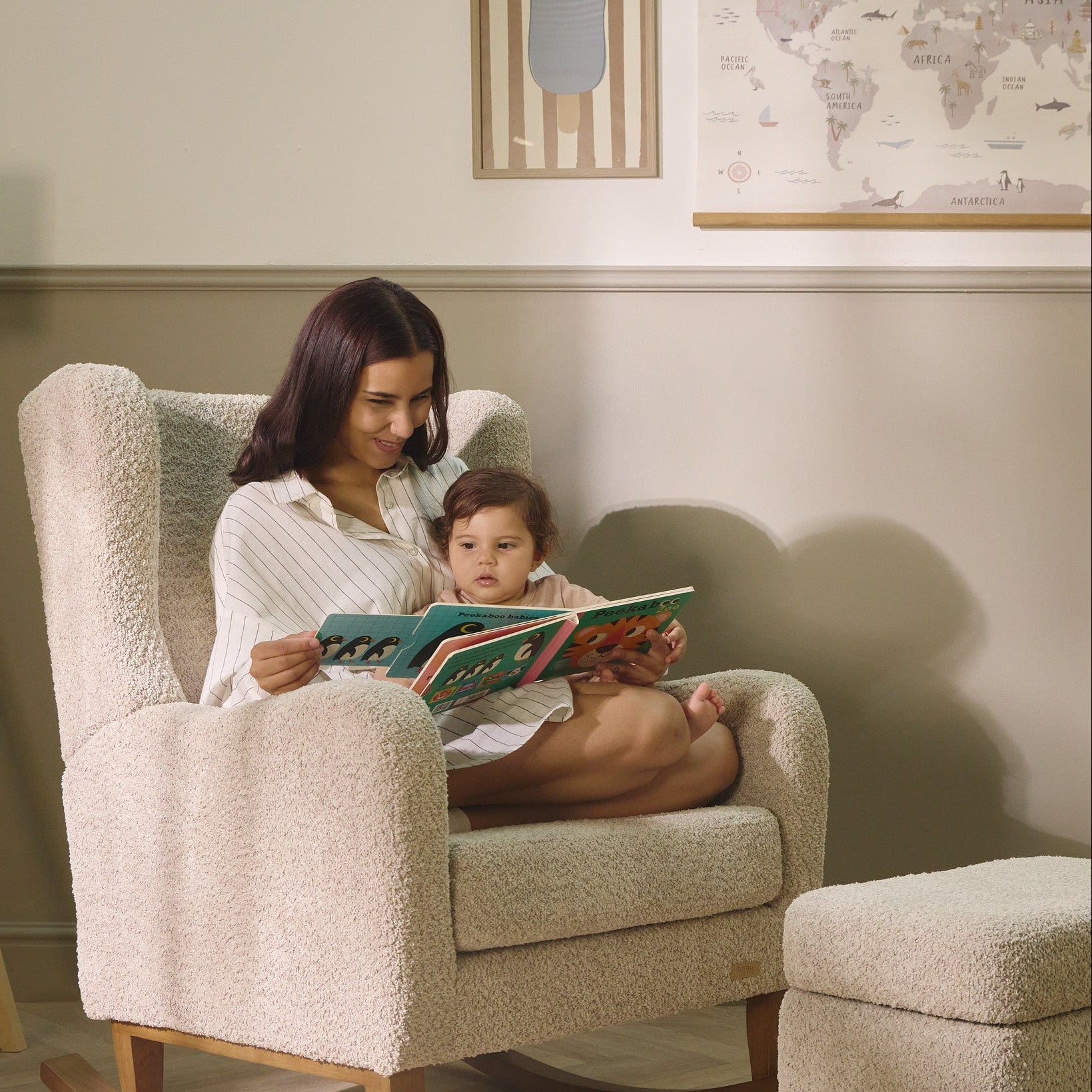 Mother reading with child on the Harper Wingback rocking chair in teddy mushroom, showing shared moments and ergonomic curved armrests.
