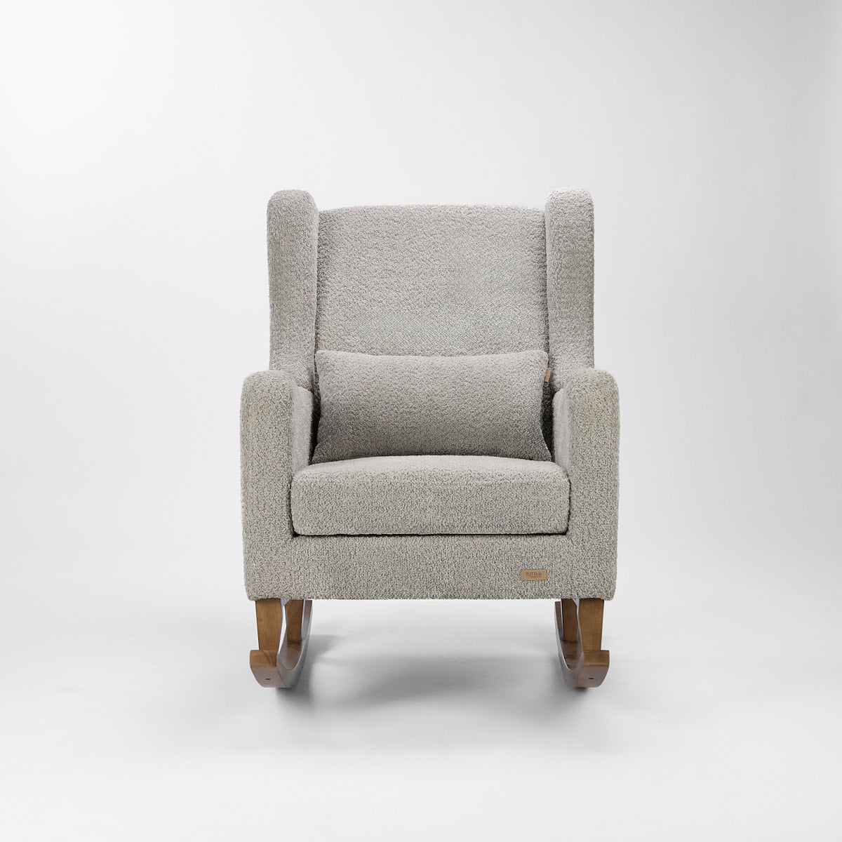 Front view of the Harper Wingback rocking chair and footstool in cloud grey, showing the supportive high back and curved rocker design.