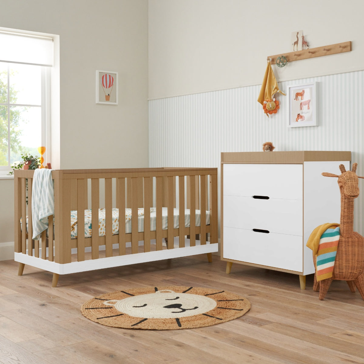 Hygge 2 Piece Nursery Room Set in White and Light Oak, pairing sleep and storage in a cohesive design