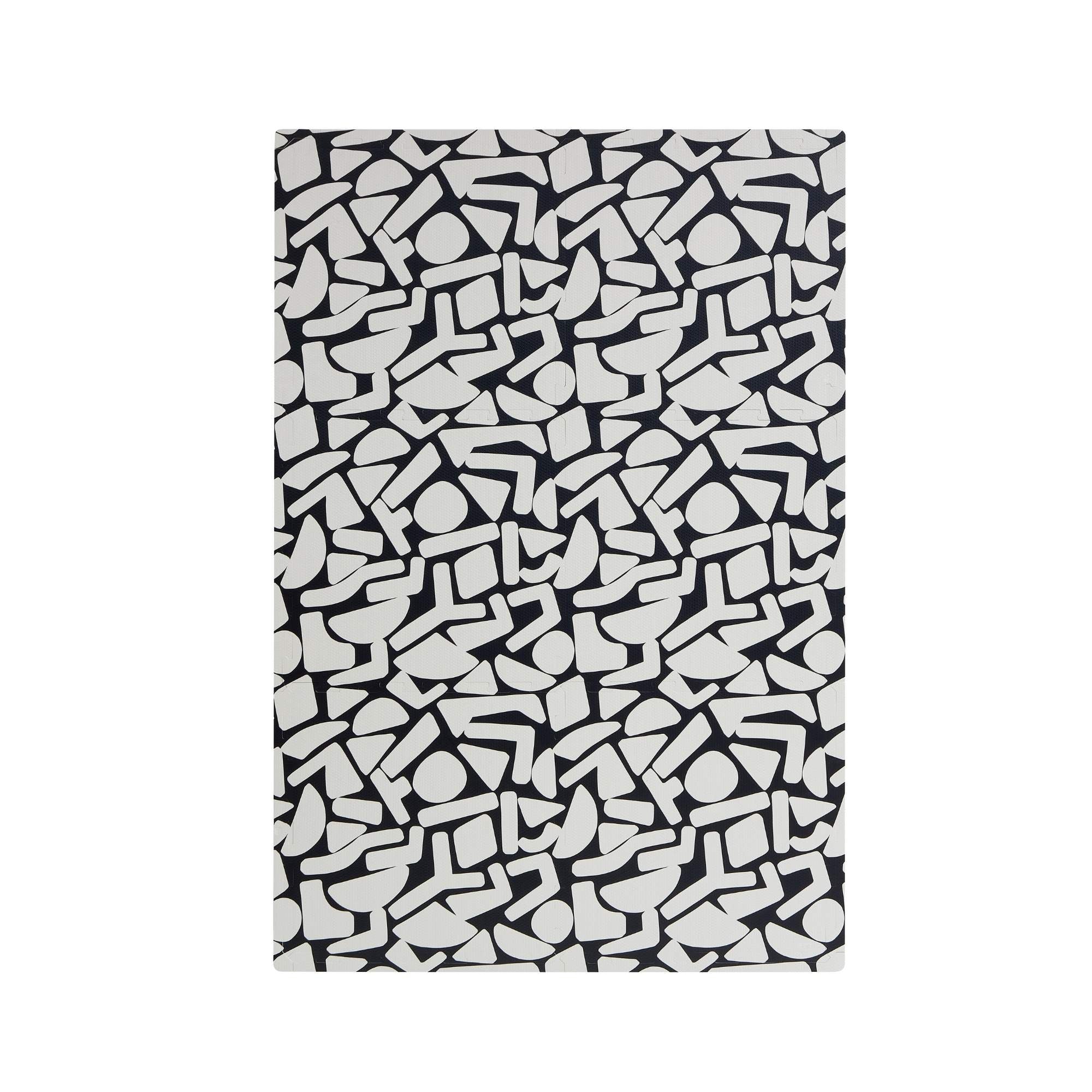 Black and white patterned infinity playmat on a white background