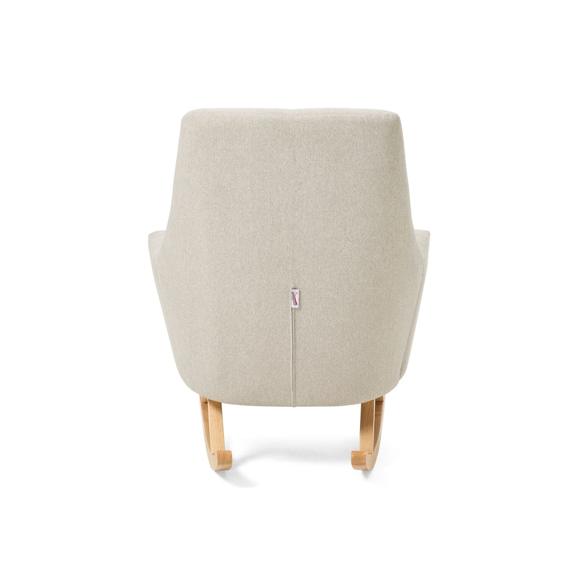Rear view of the Jonah rocking chair in Pebble showcasing the smooth upholstered backrest and wooden rocking legs.