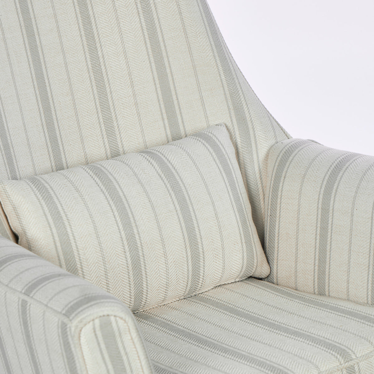 A close up of the Juno rocking chair in cashmere vintage stripe with a matching supportive pillow in a white background.