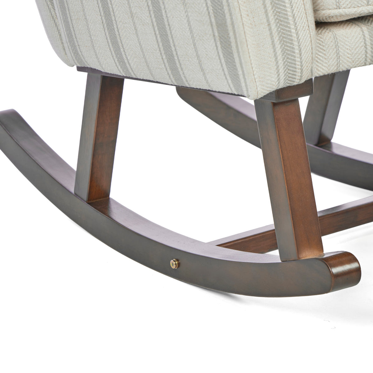 A close up of the Juno rocking chair rocking frame base in cashmere vintage stripe and walnut in a white background.