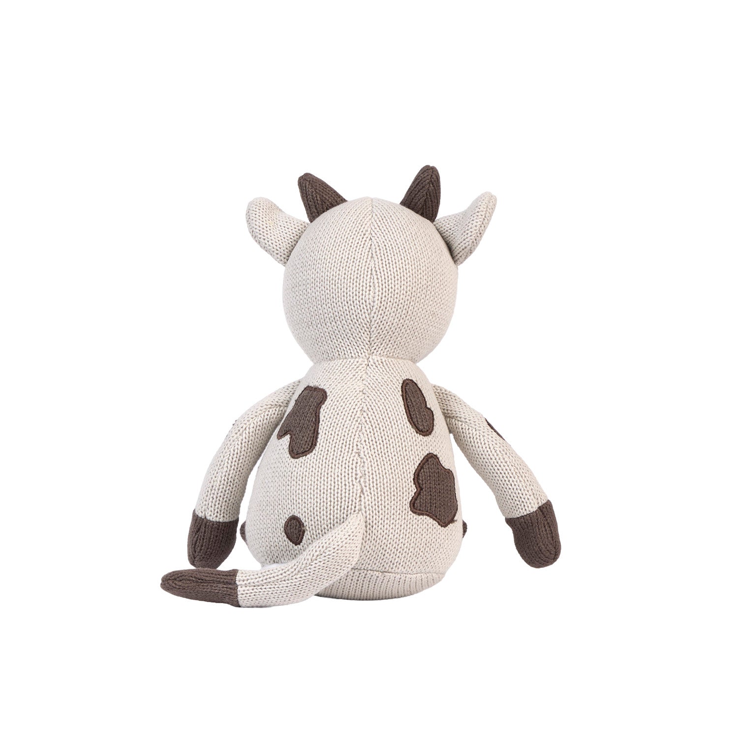 The back of Clemi cow toy on a white background.