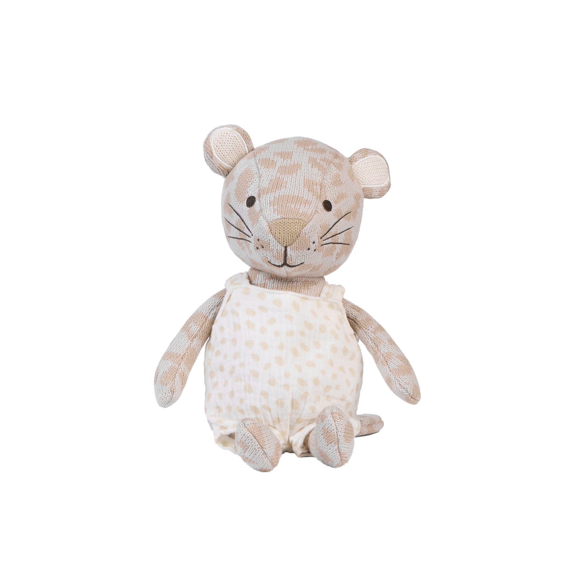 A plush stuffed animal toy shaped like a small leopard, sitting upright. The body is made of a light beige textured fabric, and it wears a cream-colored bib with tiny beige polka dots.