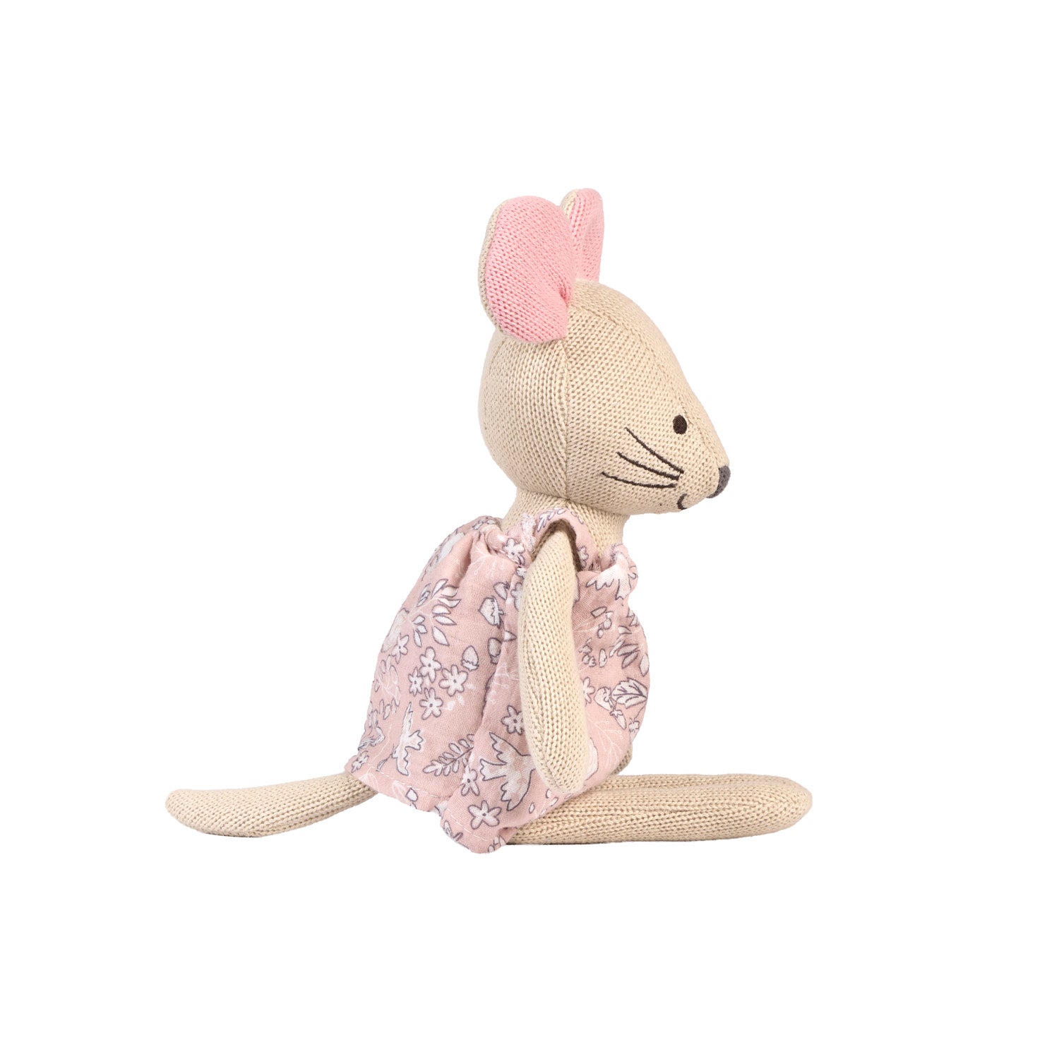 Margot Mouse knitted toy sitting sideways on a white background.