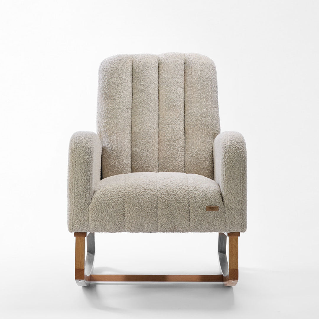 Front view of the Luca nursing chair in mushroom, showcasing a rounded silhouette, side pockets and rubberwood runners in a white background.
