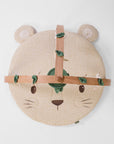 Overhead view of Love Cats luxury wood muslin play gym with padded character mat and wooden cross frame.