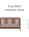 An infographic of a brown wooden cot bed with a mattress base shown on a white background, with text reading '3 position mattress base' and numbered heights 1, 2, and 3 indicating three mattress positions.