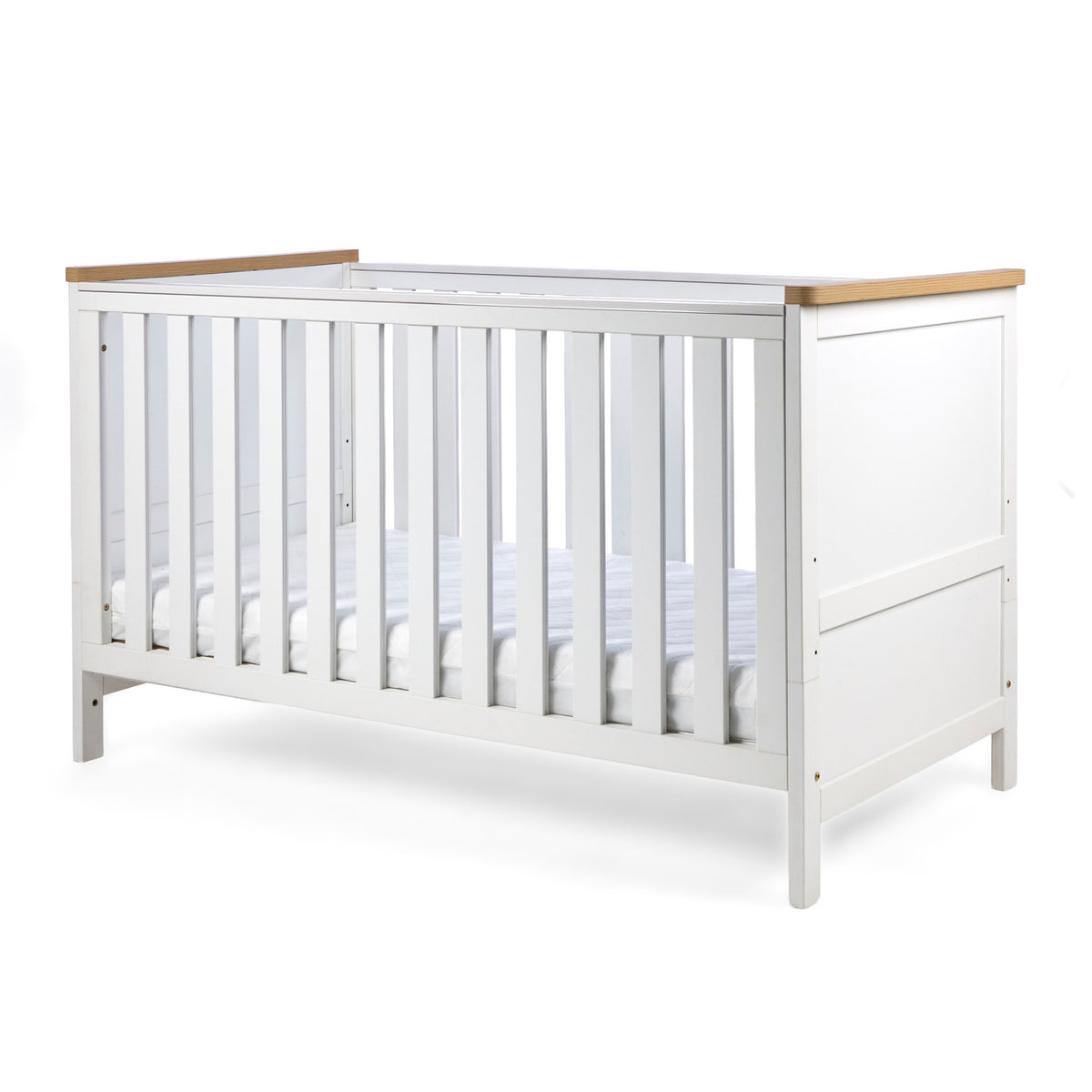 Angle view of the Misha Cot Bed in white in a white background