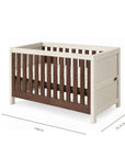 An infographic of a white cot bed with wooden panels showing dimension markings of 148 cm length, 75.2 cm width, and 85 cm height, on a plain white background.