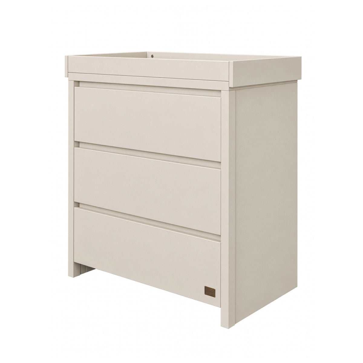 An angle view of the Modena changing unit in cashmere offers a modern look with three drawers and a removable changer.