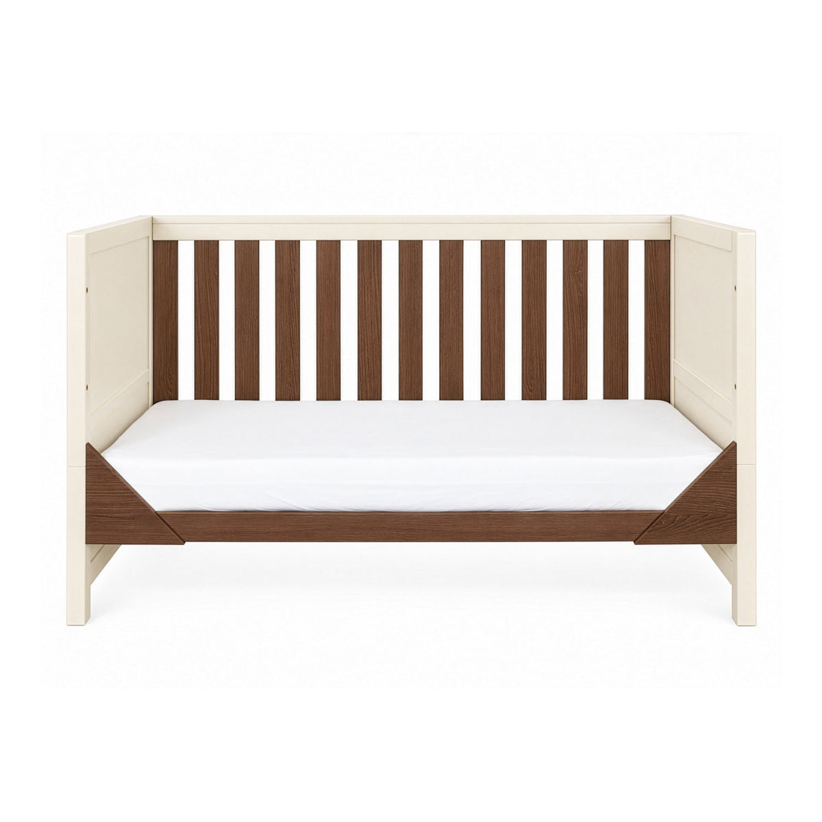 A front view of the Modena cot bed in cashmere and rich walnut converted into a sofa bed, showcasing its versatile 3-in-1 functionality for long-lasting use.