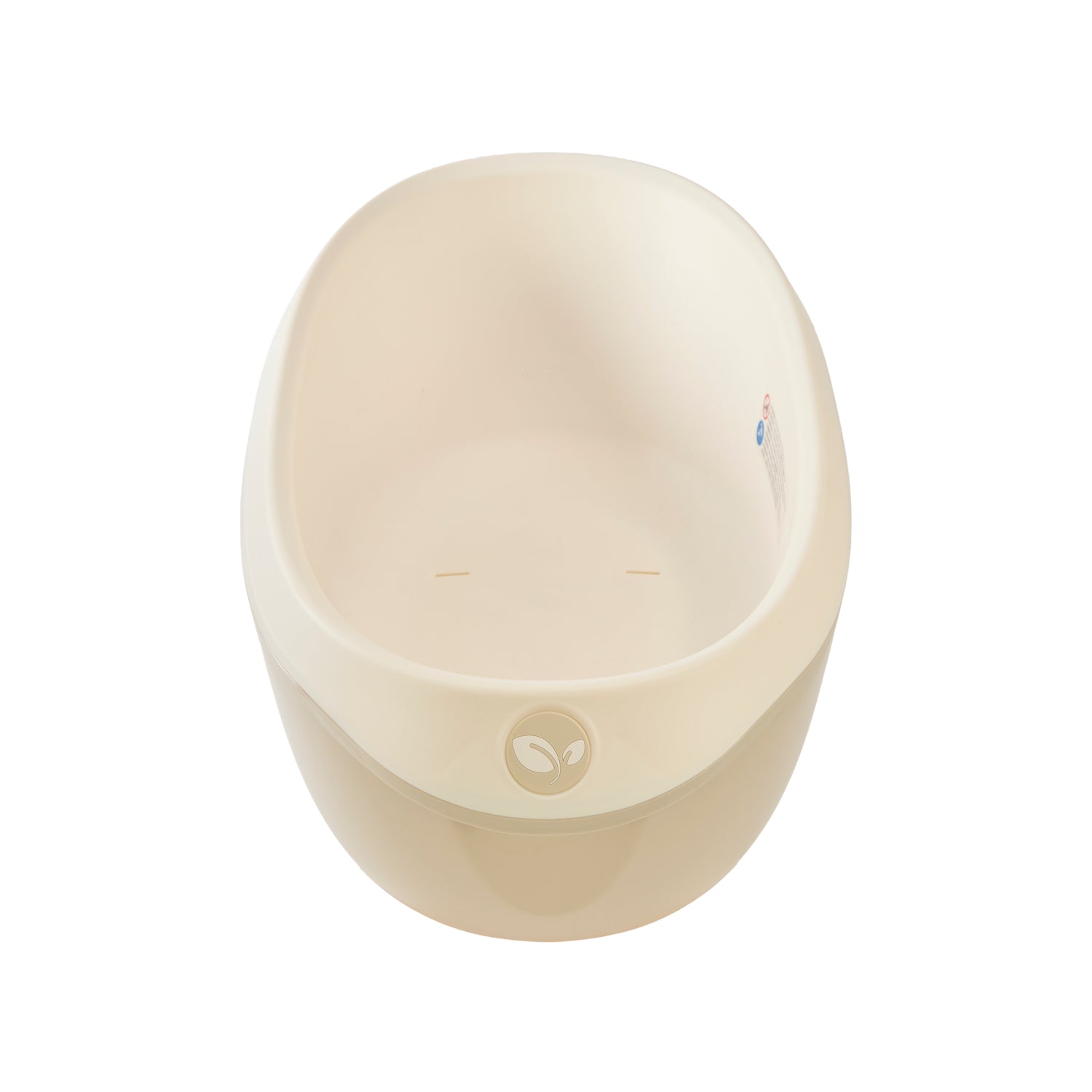 Top view of the Nati Baby Bath in dune, designed to cradle babies securely during bath time