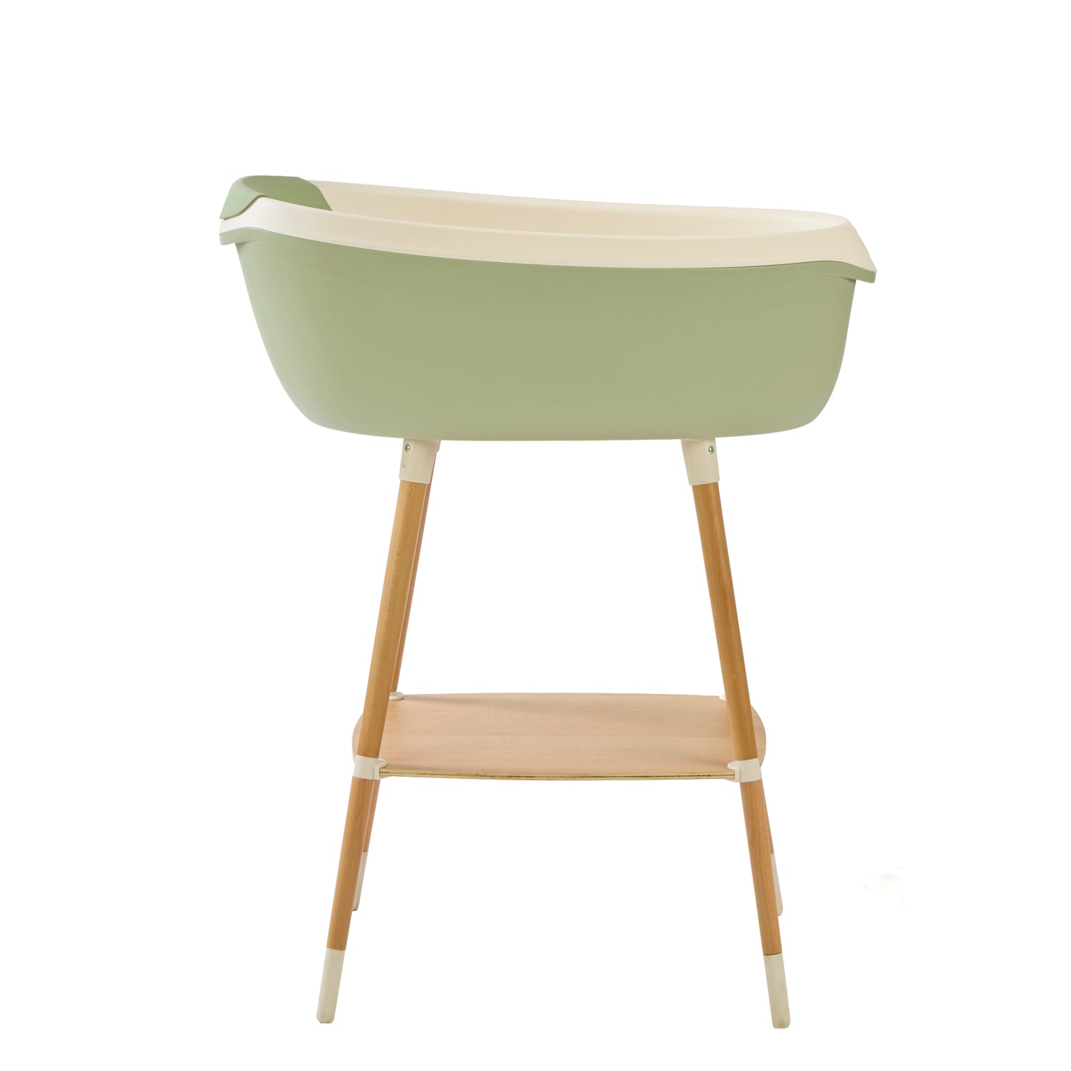 Side view of the Nati Baby Bath in aloe on a wooden stand, in a white background.