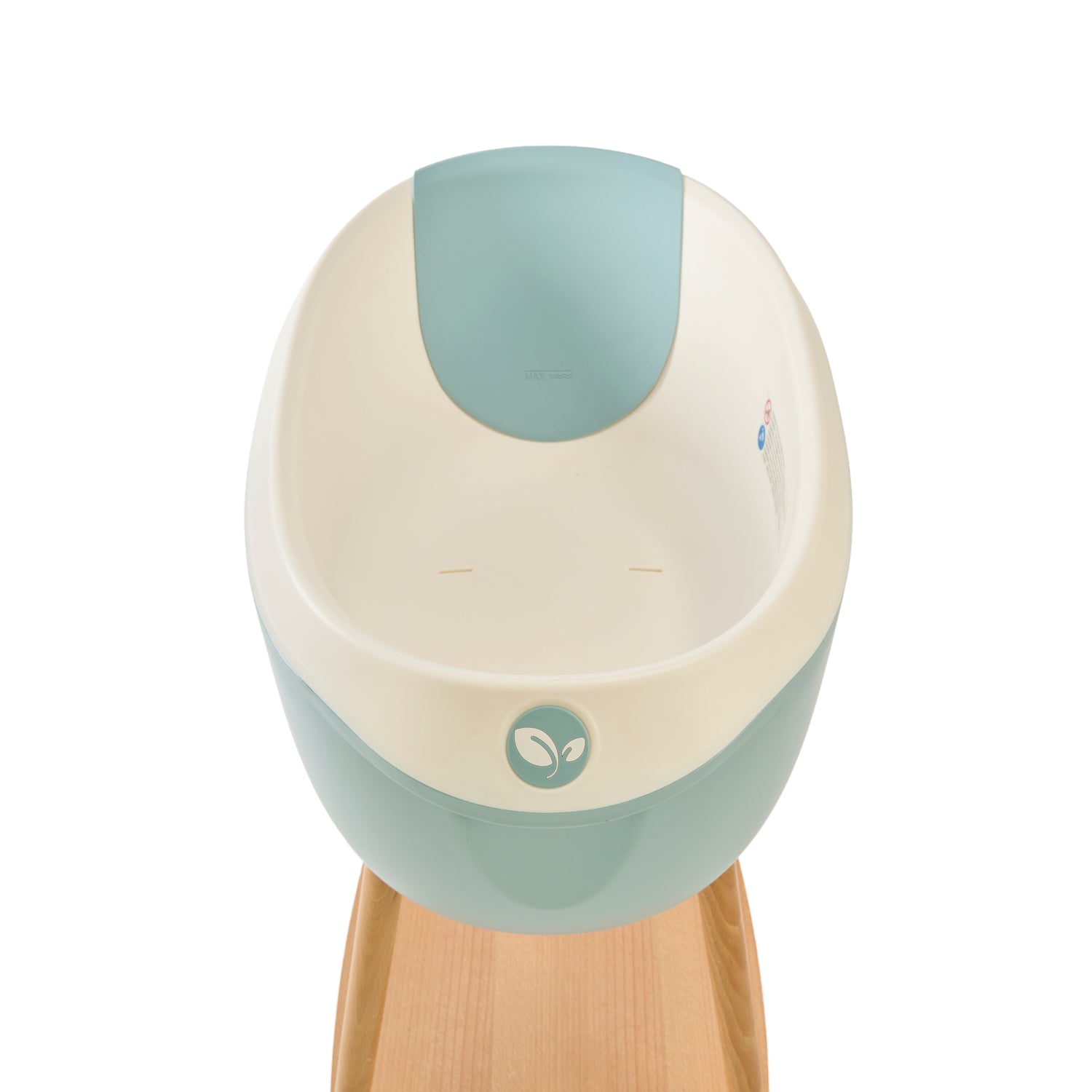 Inside view of the Nati Baby Bath in Ocean, placed on its wooden stand against a clean white background.