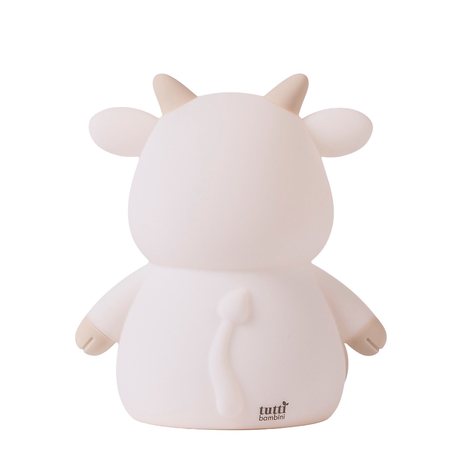 Back of a white cow-shaped night light on a white background