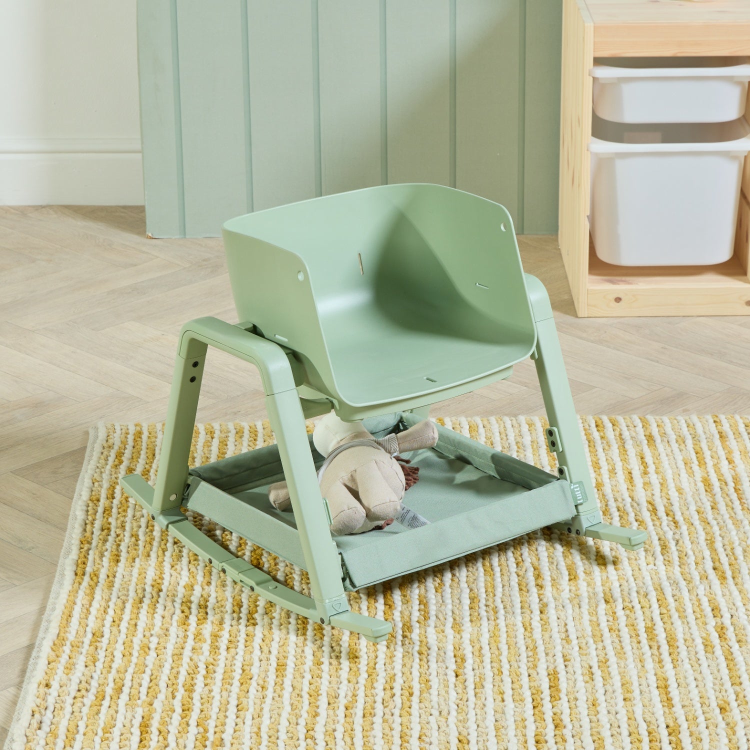 Nova Maison highchair in matcha set as toddler rocking chair mode with rocking base and secure frame.