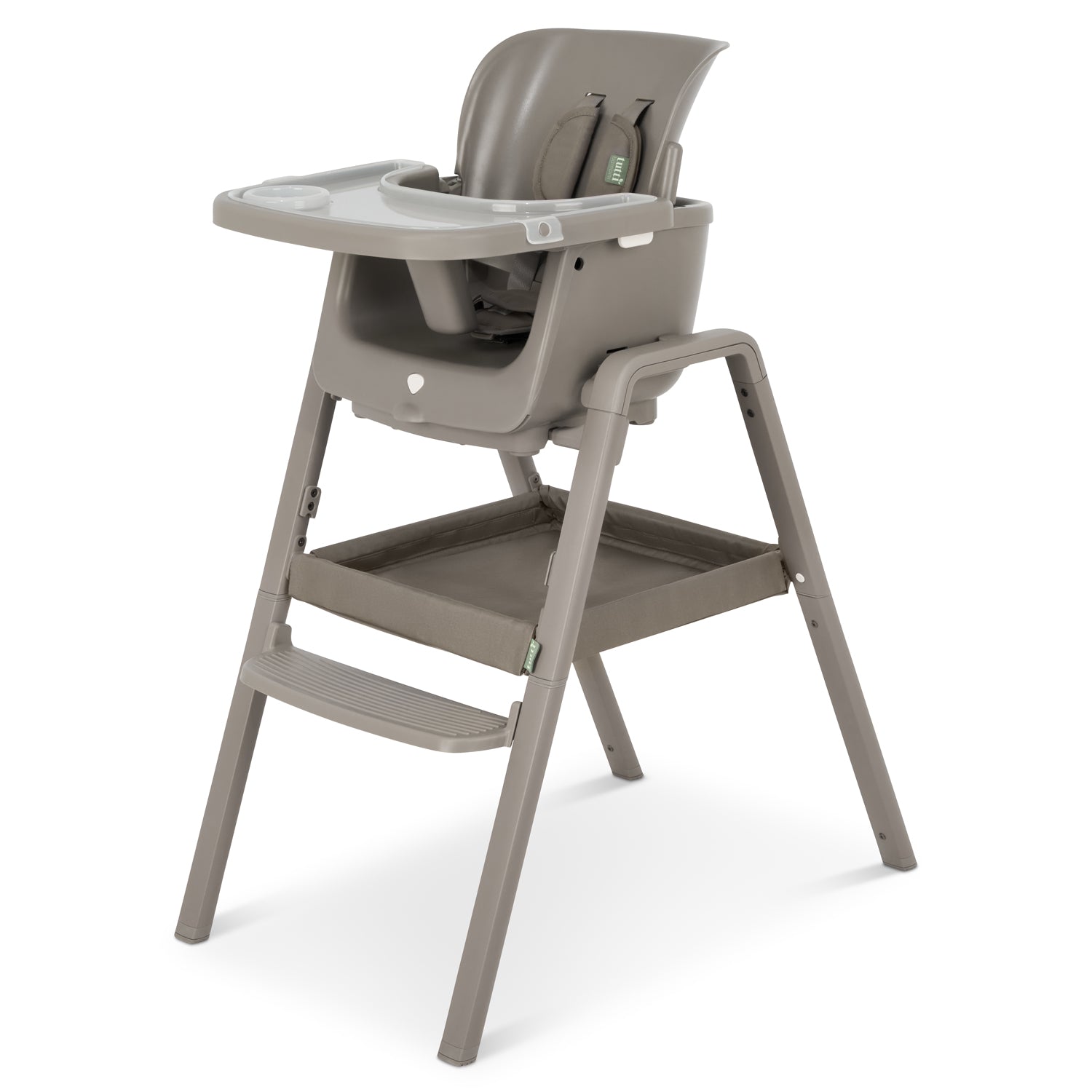 Angled cutout of the nova maison 7 in highchair in truffle, showcasing the  storage tray and versatile feeding setup.