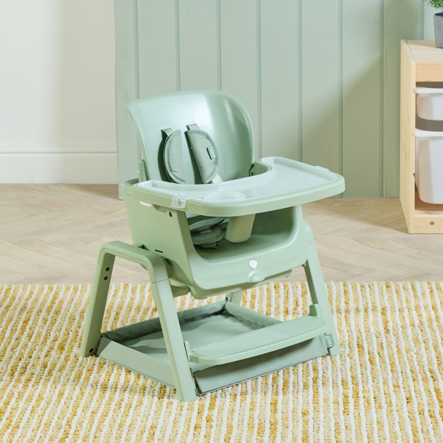 Nova Maison highchair in matcha configured as a low chair with storage tray beneath, ideal for early toddler use.