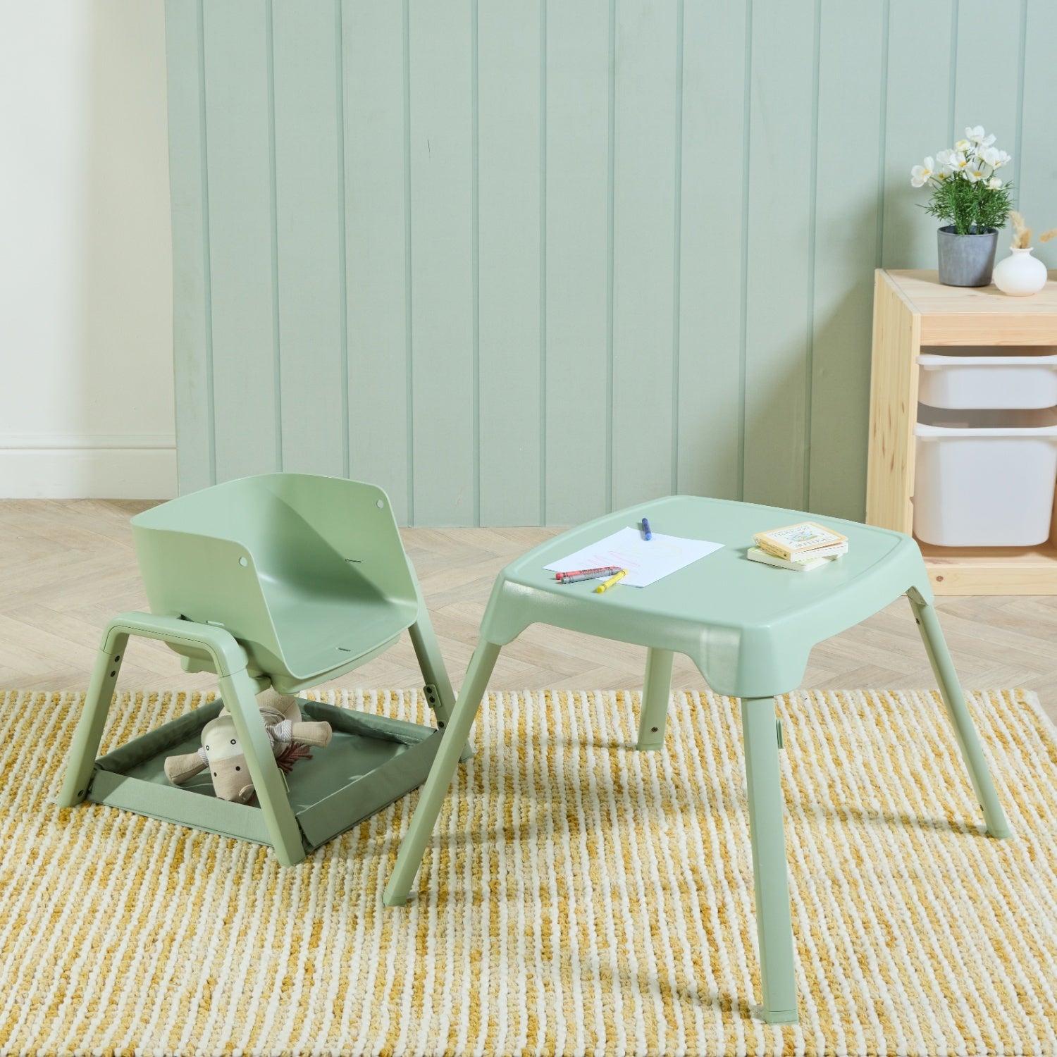 Nova Maison highchair in matcha converted into play table and chair mode, perfect for snacks and activities.