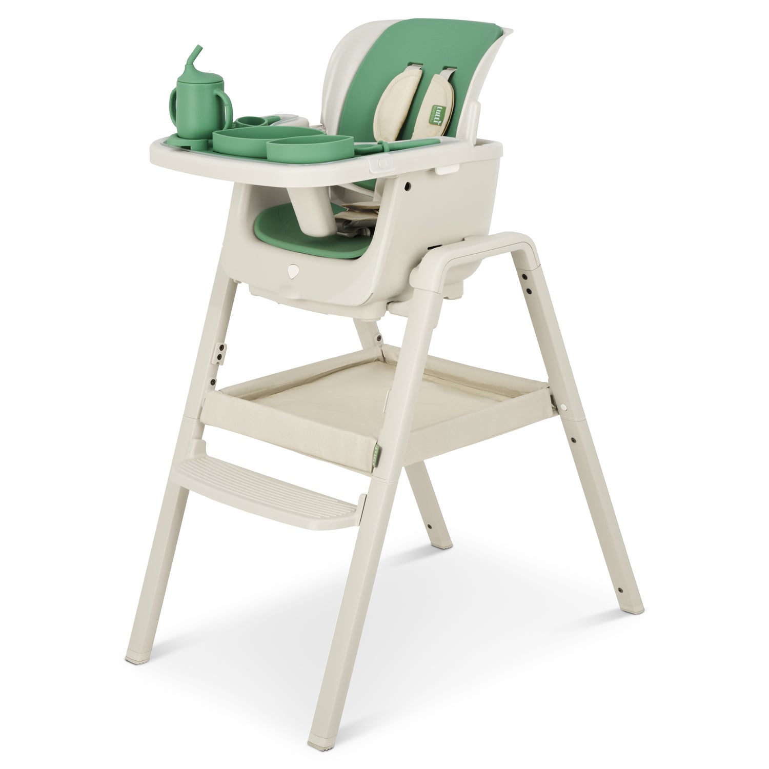 Nova Maison highchair with green accessories on a white background