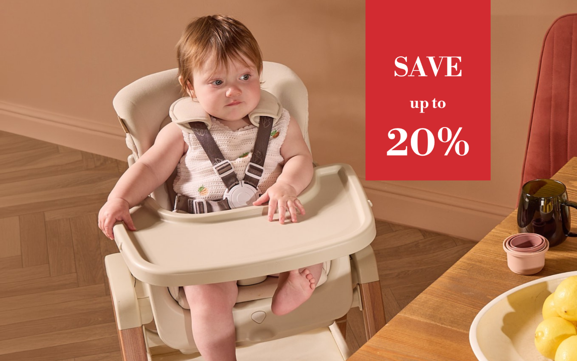 Baby in a high chair with a promotional banner offering a discount 'Save up to 20%', set against a home interior background.