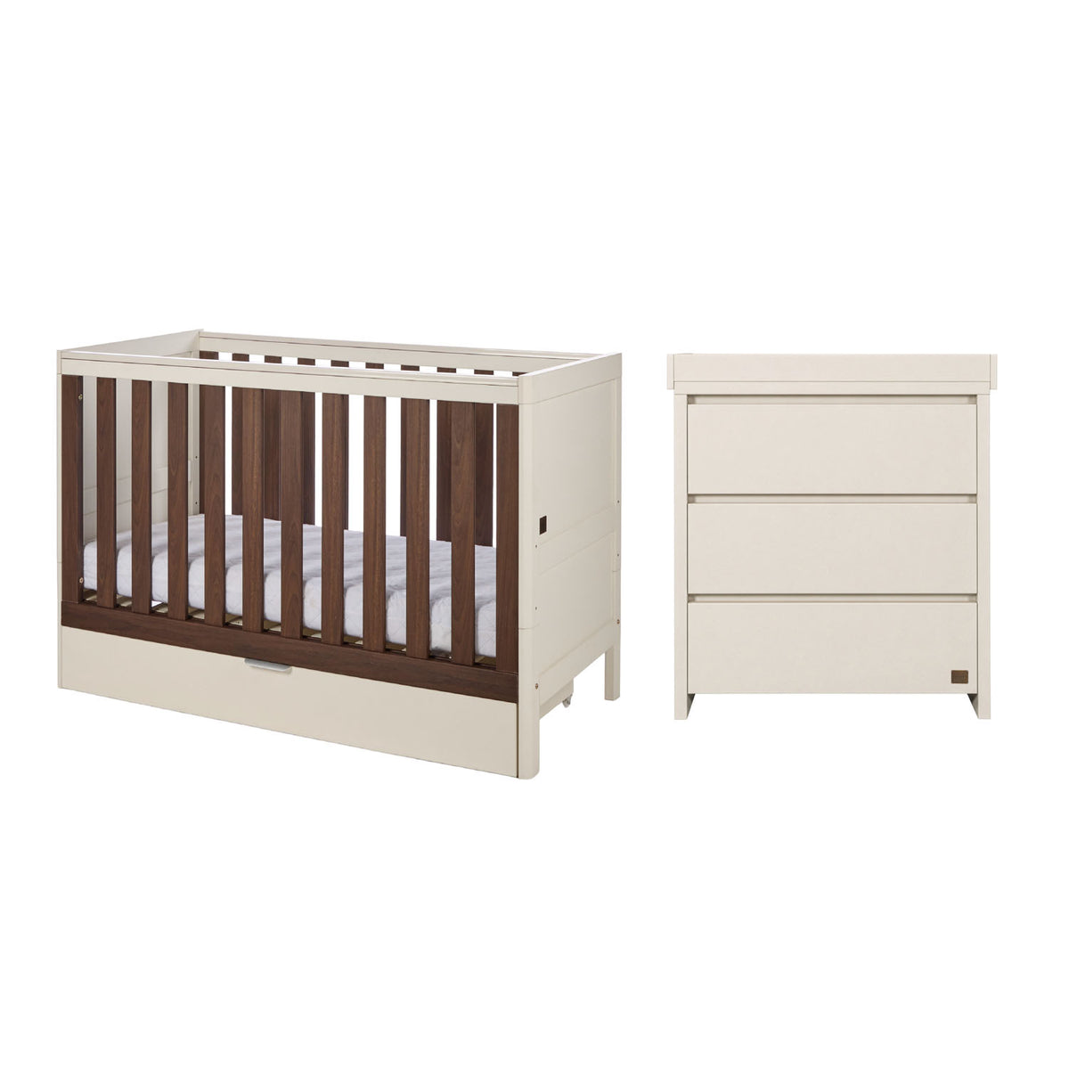 A nursery furniture set featuring a convertible cot bed and a matching chest changer, shown against a plain white background.