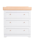 Front view of the Rio chest changer in Honey Oak and Dove Grey, featuring a changing top and three spacious drawers for baby essentials and nursery storage.